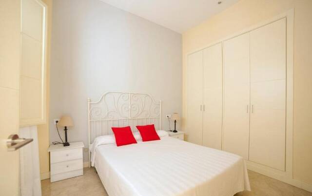 Slaapkamer in een appartement van Corral de los Chícharos in Sevilla