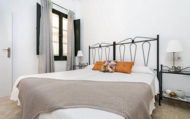 Slaapkamer in een appartement van Corral de los Chícharos in Sevilla