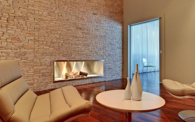 Lounge met openhaard van hotel Lützow Berlijn