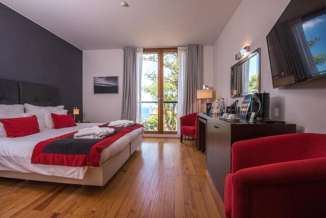 Arts in Conde Carvalhal kamer met balkon