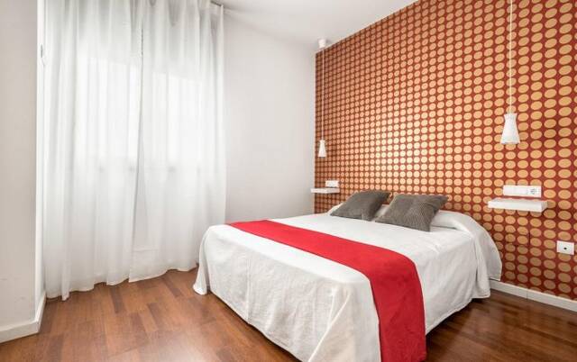 Tweepersoonsbed in vierpersoonsappartement in Appartementen Soho Boutique La Merced in Malaga