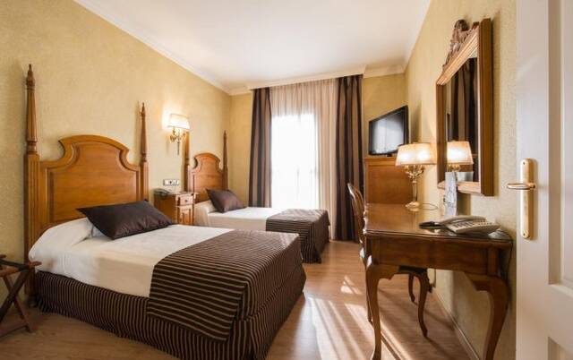 Driepersoonskamer in hotel Salles Malaga Centro in Malaga
