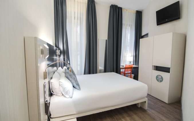 Slaapkamer in Hotel Petit Palace Canalejas in Seville