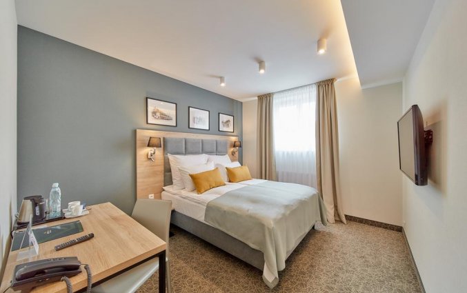 Slaapkamer van hotel 32 Krakow Old Town&nbsp;in Krakau