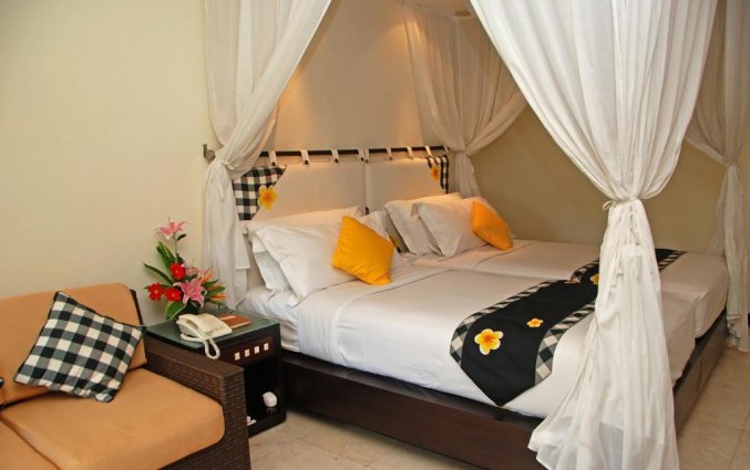 Slaapkamer van hotel Legian Beach in Bali