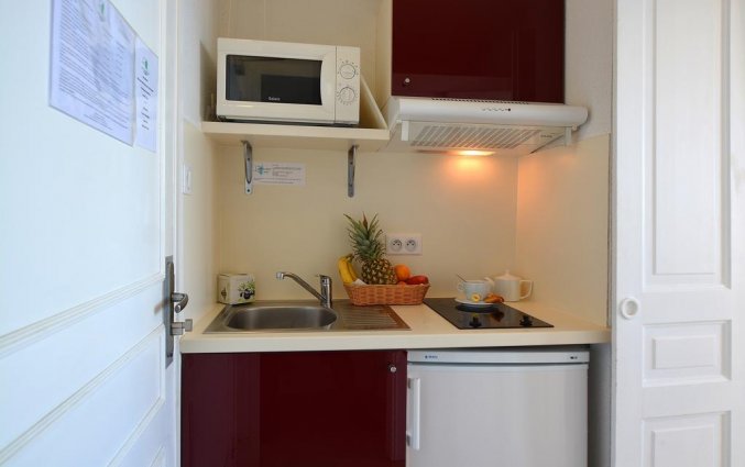 Keuken in appartement van Résidence Les Calanques op Corsica