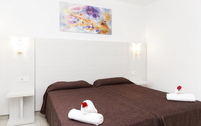Slaapkamer van Appartementen Roc Lago Park op Menorca