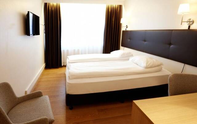 Tweepersoonskamer van hotel Fosshotel Lind
