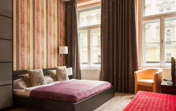 Slaapkamer van Appartementen Royal Court Legerova in Praag