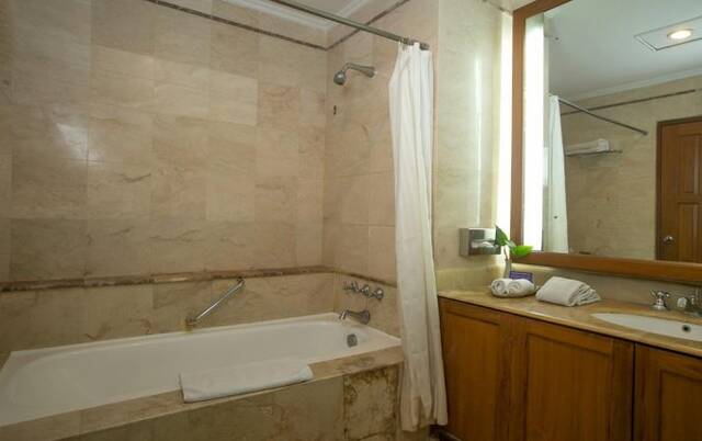 Badkamer van Resort en Spa Parigata