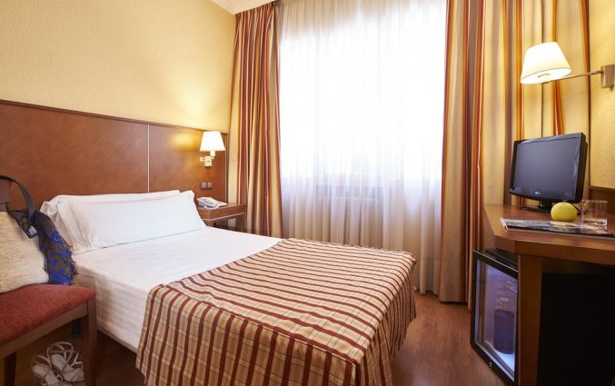 Slaapkamer van hotel Casón Del Tormes in Madrid