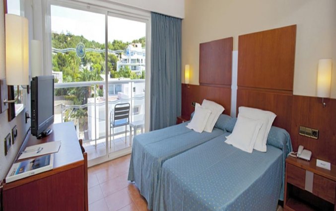 Slaapkamer van hotel Simbad in Ibiza