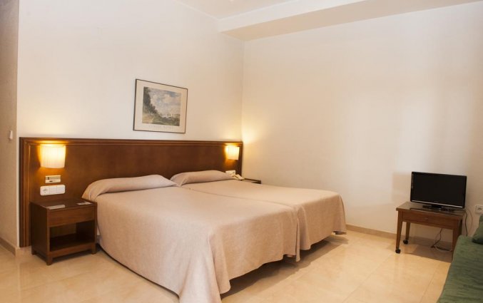 Slaapkamer van hotel Lloyds Beach Club in Alicante