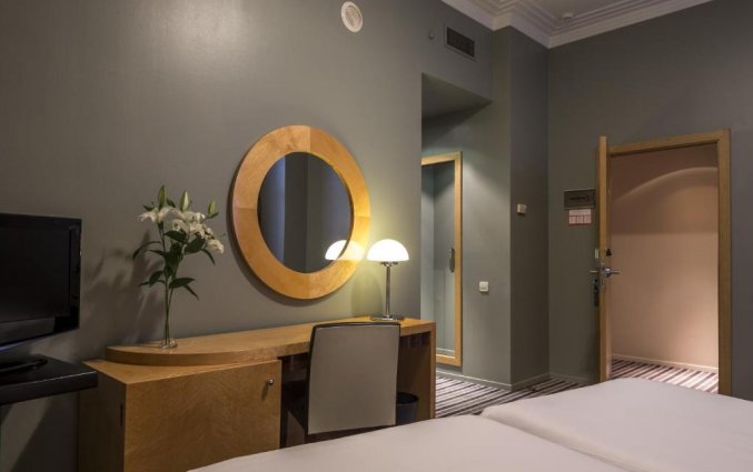 Slaapkamer van hotel Room Mate Larios in Malaga