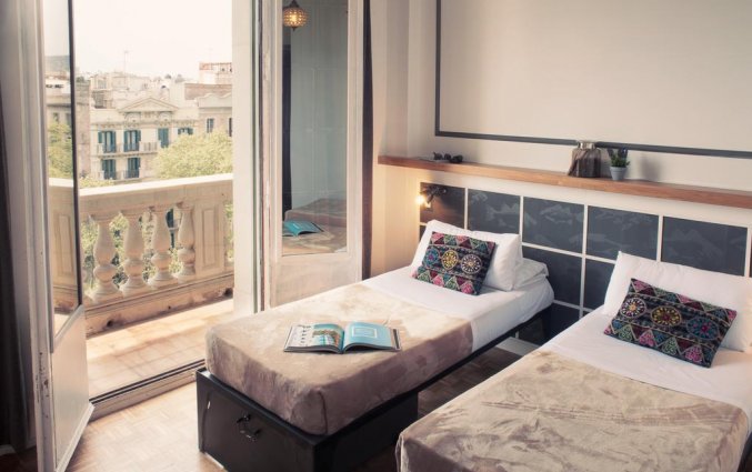 Slaapkamer van hotel Casa Gracia in Barcelona