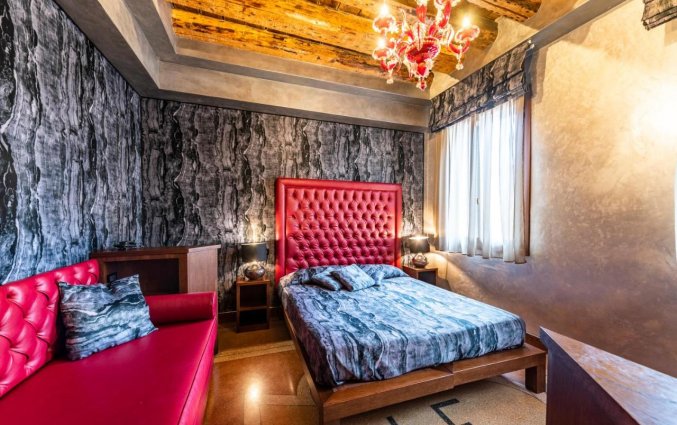 Slaapkamer bij Hotel Abbazia