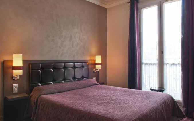 Tweepersoonskamer van Grand Hotel Leveque in Parijs