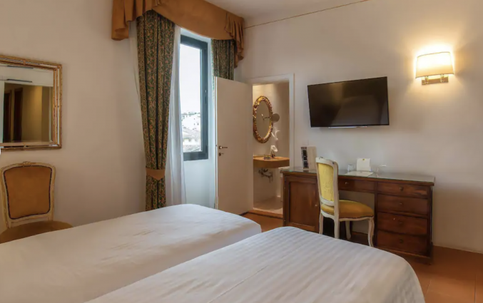 Slaapkamer in Hotel Machiavelli Palace