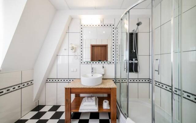 Badkamer van Hotel Piast in Wrocław