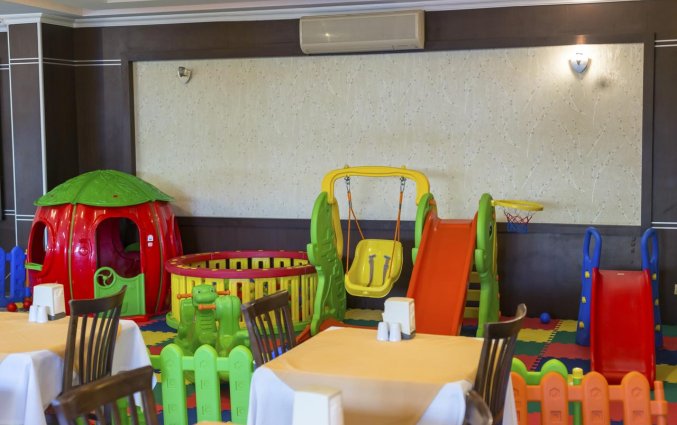 Binnenspeelplaats voor kinderen van Aparthotel Risus in Side