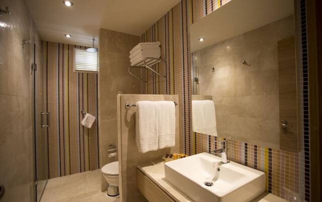 Badkamer van een tweepersoonskamer van Hotel Melas Holiday Village in Side