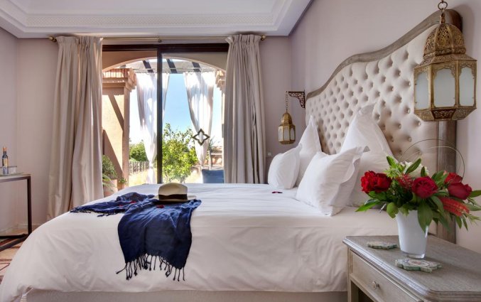 Tweepersoons slaapkamer in hotel Palais de l'O in Marrakech