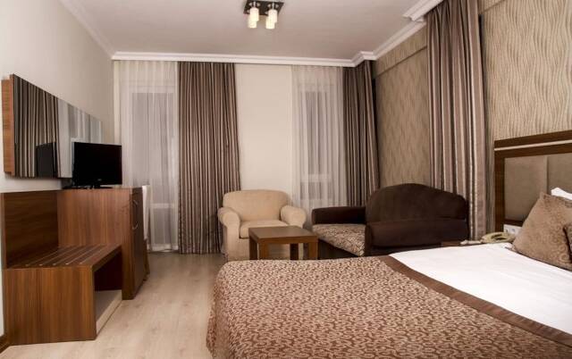 Slaapkamer van Hotel The Corner Park in Antalya