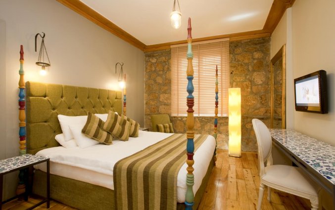 Slaapkamer van Hotel Alp Pasa in Antalya
