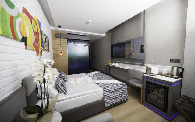Slaapkamer van Hotel &amp; Spa Laren Family in Antalya