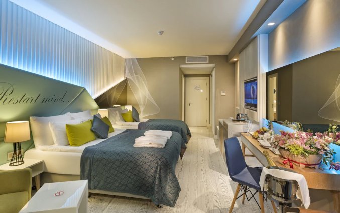 Slaapkamer van Hotel Wind of Lara in Antalya