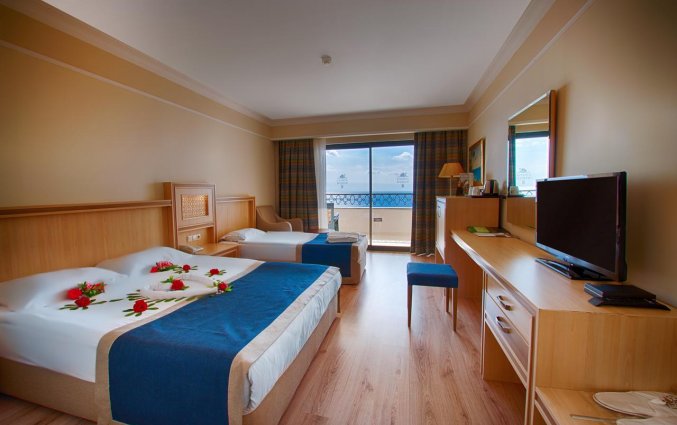 Slaapkamer van Hotel Utopia World in Alanya