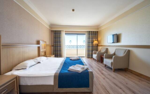 Slaapkamer van Hotel Utopia World in Alanya
