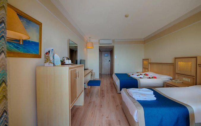 Slaapkamer van Hotel Utopia World in Alanya