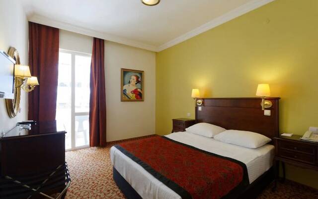 Slaapkamer van Hotel Antique Roman Palace in Alanya