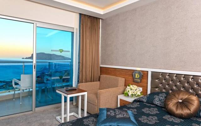 Slaapkamer van Hotel Diamond Hill Resort in Alanya