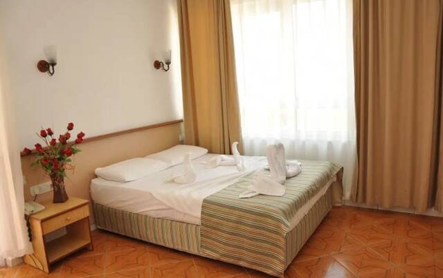 Slaapkamer van Hotel Ozcan in Alanya