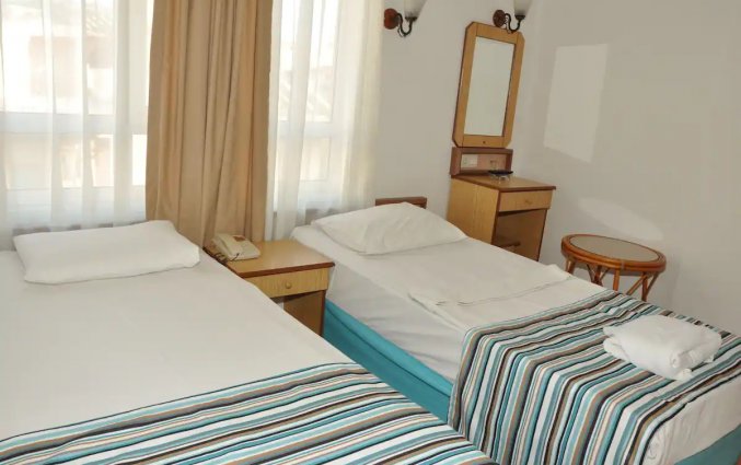 Slaapkamer van Hotel Ozcan in Alanya