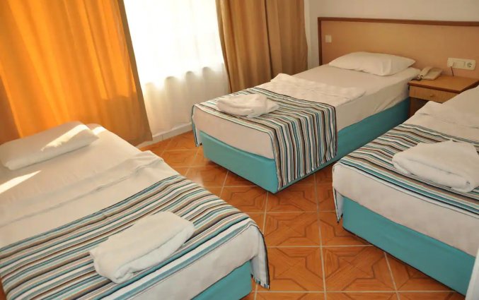 Slaapkamer van Hotel Ozcan in Alanya