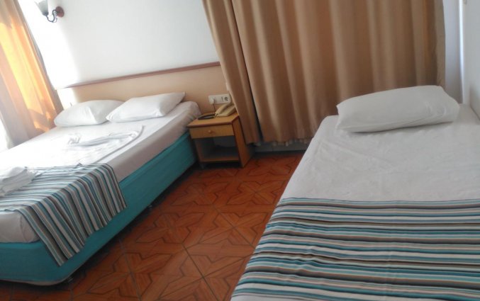 Slaapkamer van Hotel Ozcan in Alanya