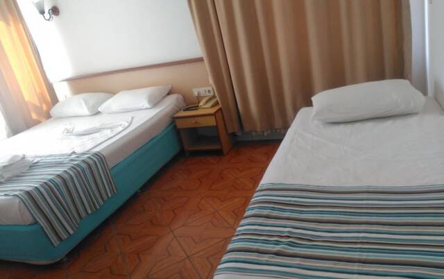 Slaapkamer van Hotel Ozcan in Alanya