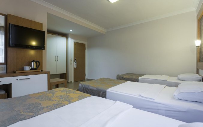 Slaapkamer van Hotel Lonicera City in Alanya