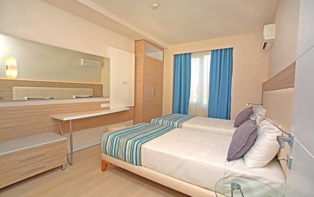 Slaapkamer van Aparthotel Vega Green in Alanya