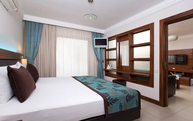 Slaapkamer van Hotel Xperia Grand Bali in Alanya