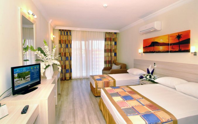 Slaapkamer van Hotel Gardenia Beach in Alanya
