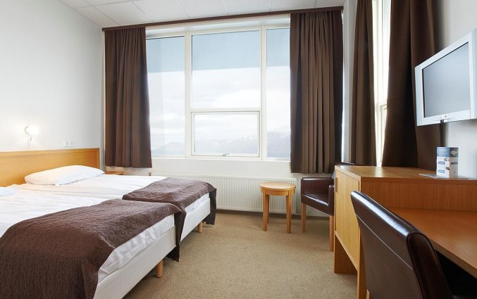 Tweepersoonskamer van hotel cabin in IJsland
