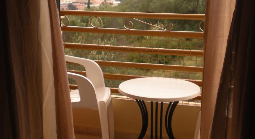 Balkon van een appartement van Appartementen Lofos op Corfu