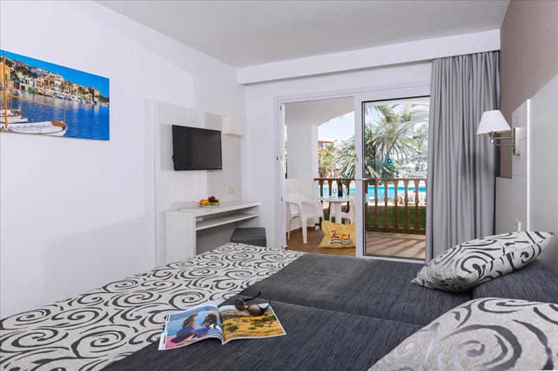 Slaapkamer van hotel Primasol Cala d'Or Gardens in Mallorca