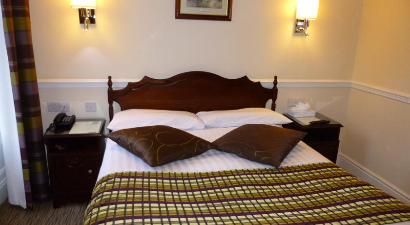 Slaapkamer van hotel Harcourt in Dublin