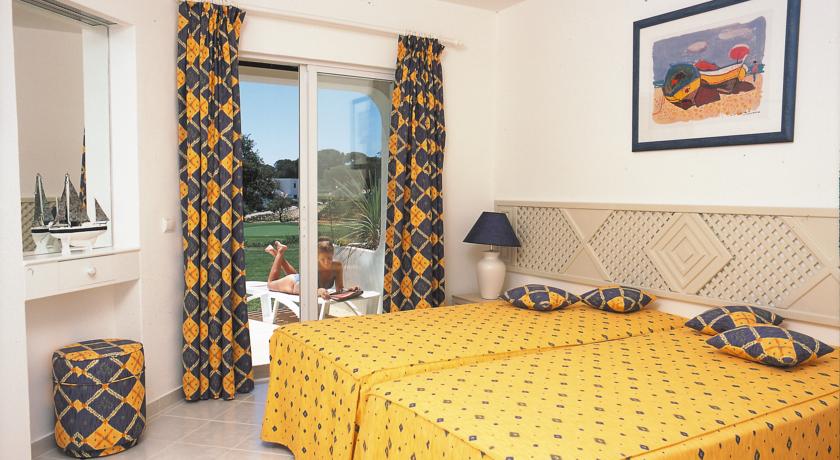 Slaapkamer van een appartement van Resort Balaia Golf Village in Algarve