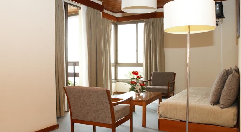 Zithoek van een kamer van Hotel Cheerfulway Bravamar Madeira